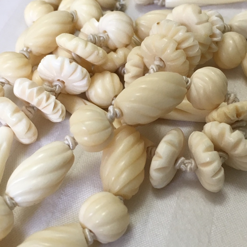 Lee Angle Hand carved bone necklace 44”